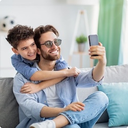 Father taking Selifie With Son While Wearing Avulux Glasses